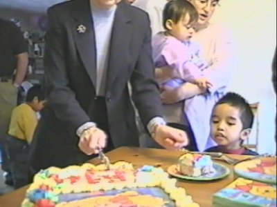 Mia and Mom waiting for cake