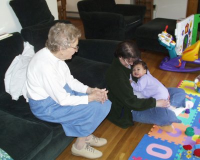 Mia and Mom with Gram at party