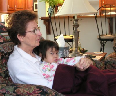 Mia sitting with Grand-Mom