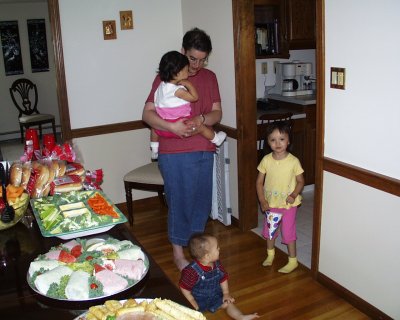 Mia and Mom with Andrew (sitting) and Anna (standing)