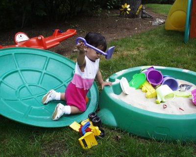 Mia at Andrew and Anna's sandbox