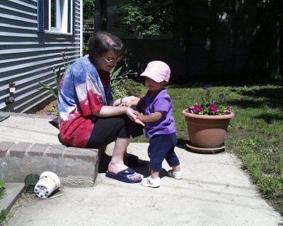 Mia outside on our small porch with Mom