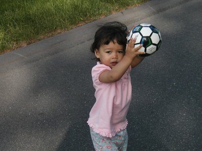 Mia about to throw the soccer ball