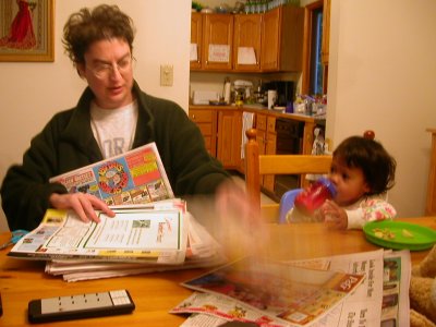 Mia with Mom Going Over Coupons