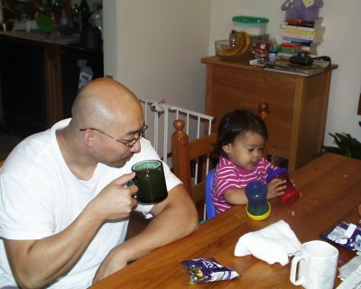 Mia eating snacks with Ron Umali