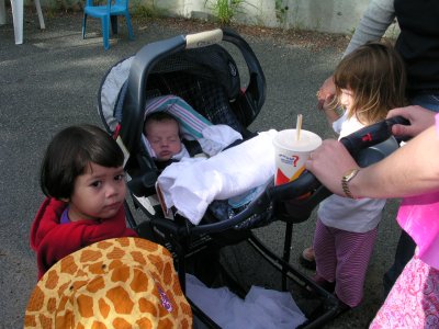 Mia with baby Benjamin (neighbor) and Caitlin (neighbor)