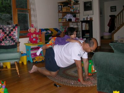 Daddy being a pony for Mia