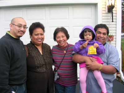 Mia with Uncle Ron, Tita Vicky, Grand Mom, and Tito Ben