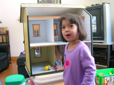 Mia and her new doll house