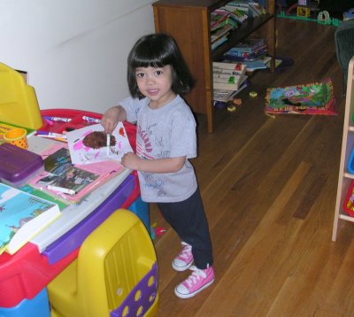 Mia with her pink sneakers