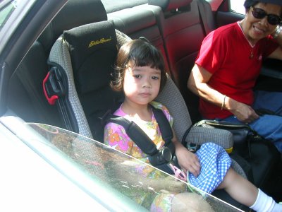 Mia in car with Lola