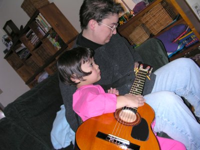 Mia and her new guitar