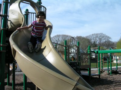 Mia going down a slide