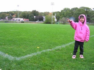 Mia in center field, pointing