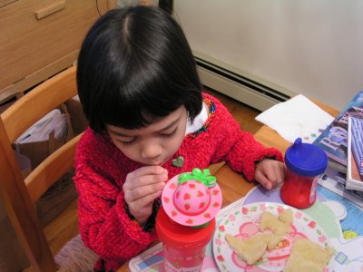 Mia taking a sip on Valentine's Day