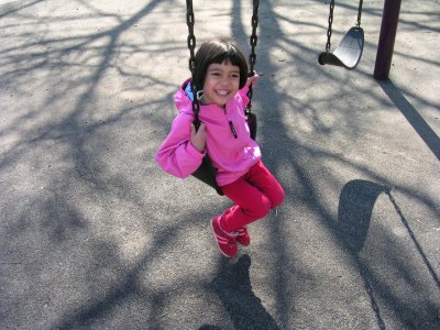 Mia on a swing