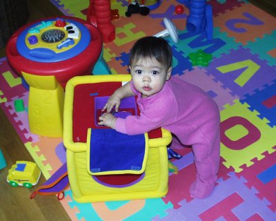 Mia on her play box