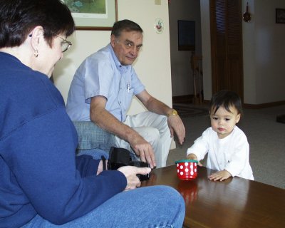 Mia playing with Aunt Jeanne and Grand Pop