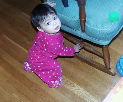 Mia at home by rocking chair