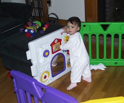 Mia in her play pen