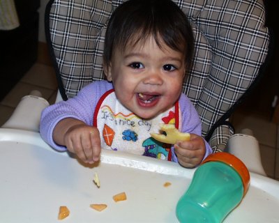 Mia enjoying a mini-pancake