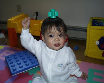 Mia with a block on her head