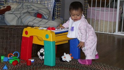 Mia getting down from the table