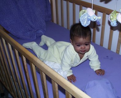 Mia crying in her crib