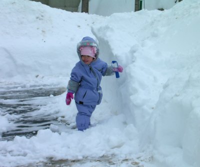 Mia with her little shovel