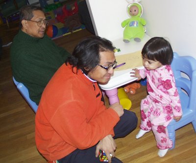 Mia with Grandpa Umali and Renato